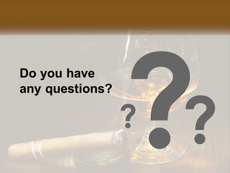 A Glass Of Wine And A Cigar On A Table PowerPoint Template