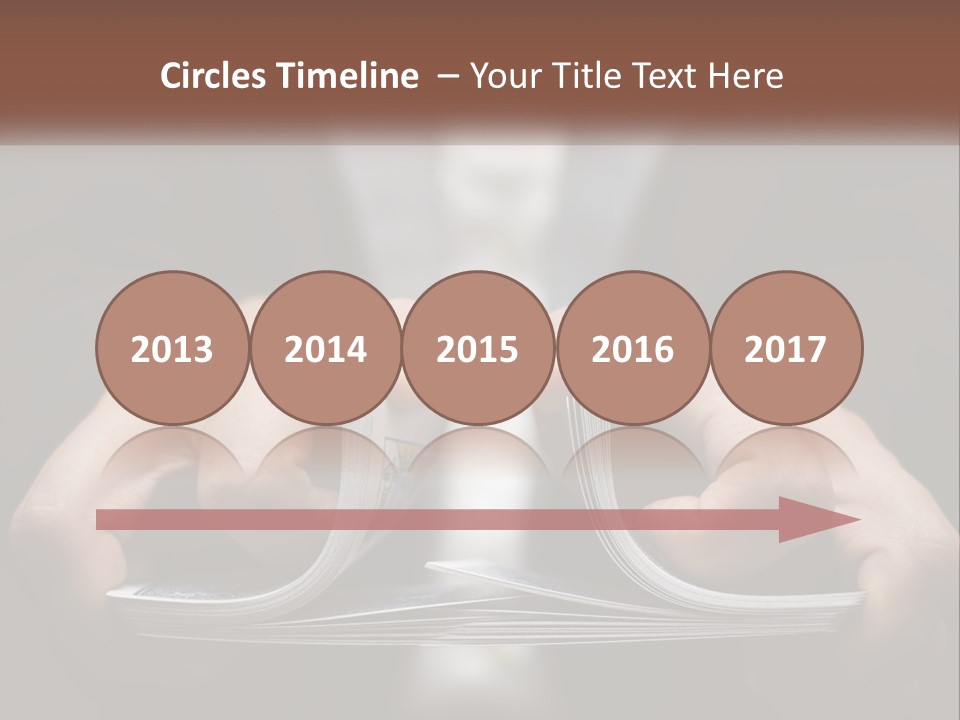 A Person Holding A Piece Of Paper In Their Hands PowerPoint Template