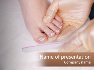 A Manicure Being Applied To A Woman's Foot PowerPoint Template