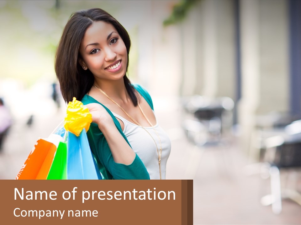 A Beautiful Woman Holding Shopping Bags In Her Hands PowerPoint Template