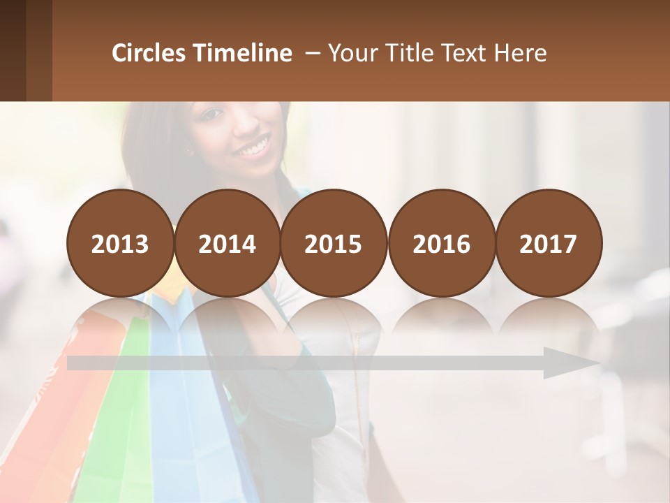 A Beautiful Woman Holding Shopping Bags In Her Hands PowerPoint Template