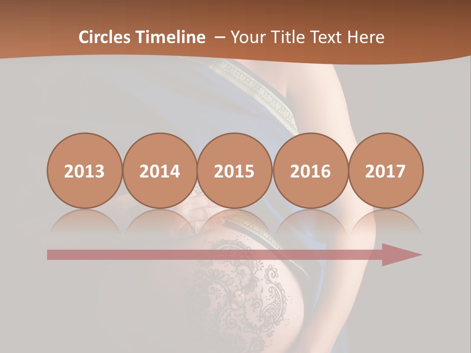 A Pregnant Woman In A Blue Sari Holding Her Belly PowerPoint Template