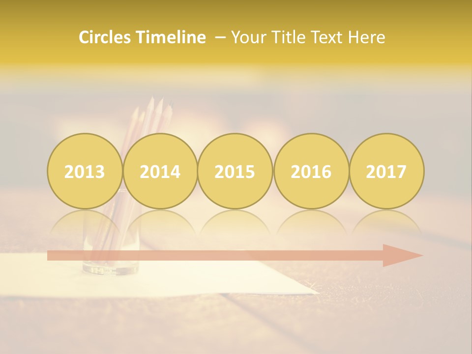 A Table With A Glass And Two Pencils In It PowerPoint Template