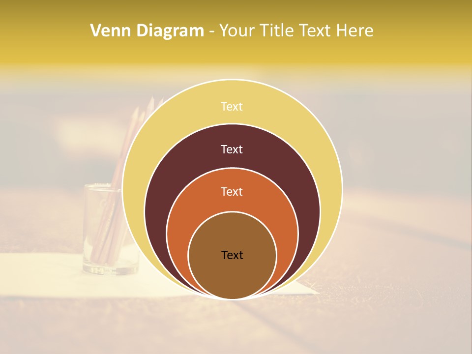 A Table With A Glass And Two Pencils In It PowerPoint Template