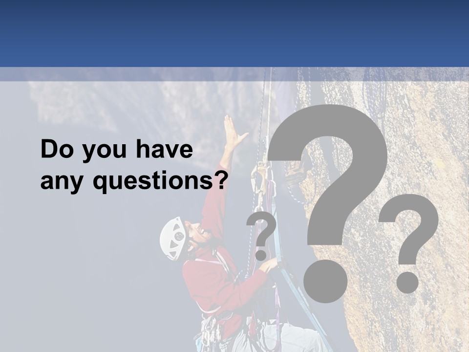 A Man Climbing Up The Side Of A Mountain PowerPoint Template