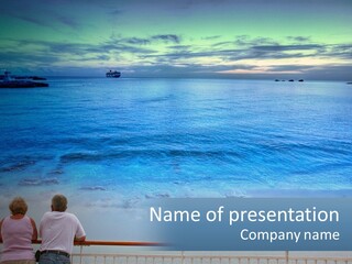 Two People Are Looking Out At The Ocean PowerPoint Template