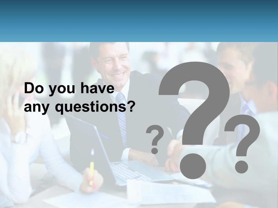 A Group Of People Sitting Around A Table Shaking Hands PowerPoint Template