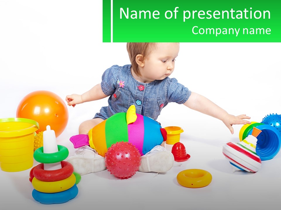 A Baby Playing With Toys On A White Background PowerPoint Template