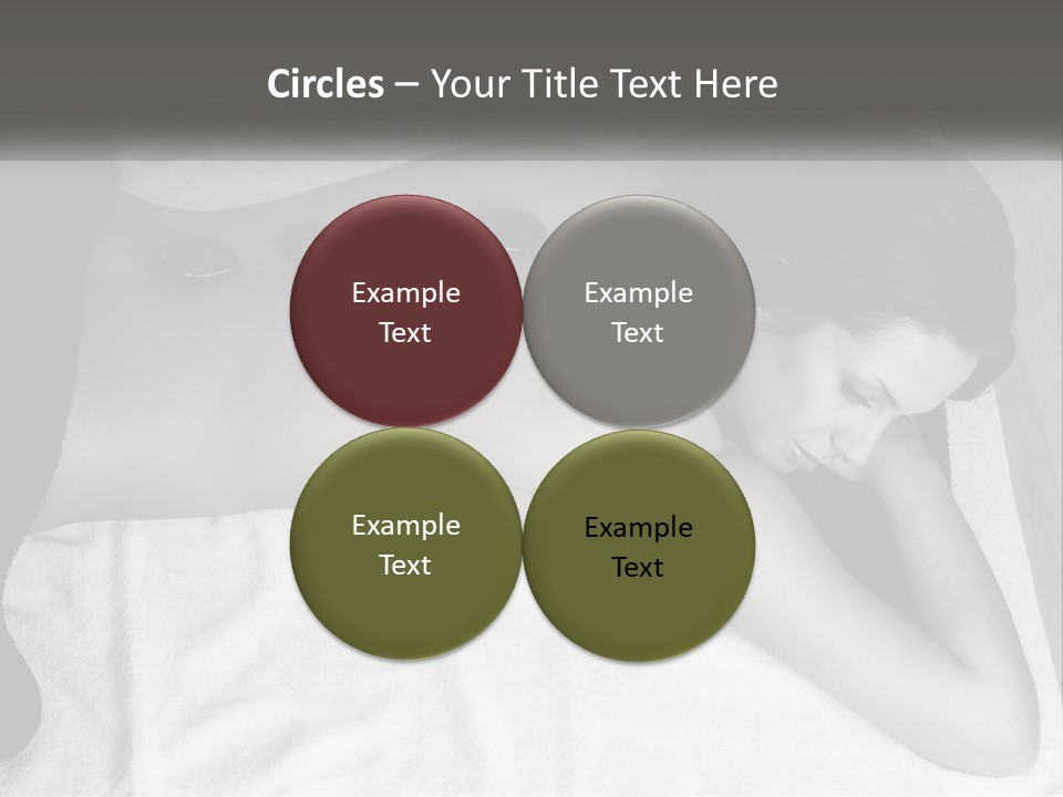 A Woman Laying On Top Of A Towel Covered In Stones PowerPoint Template