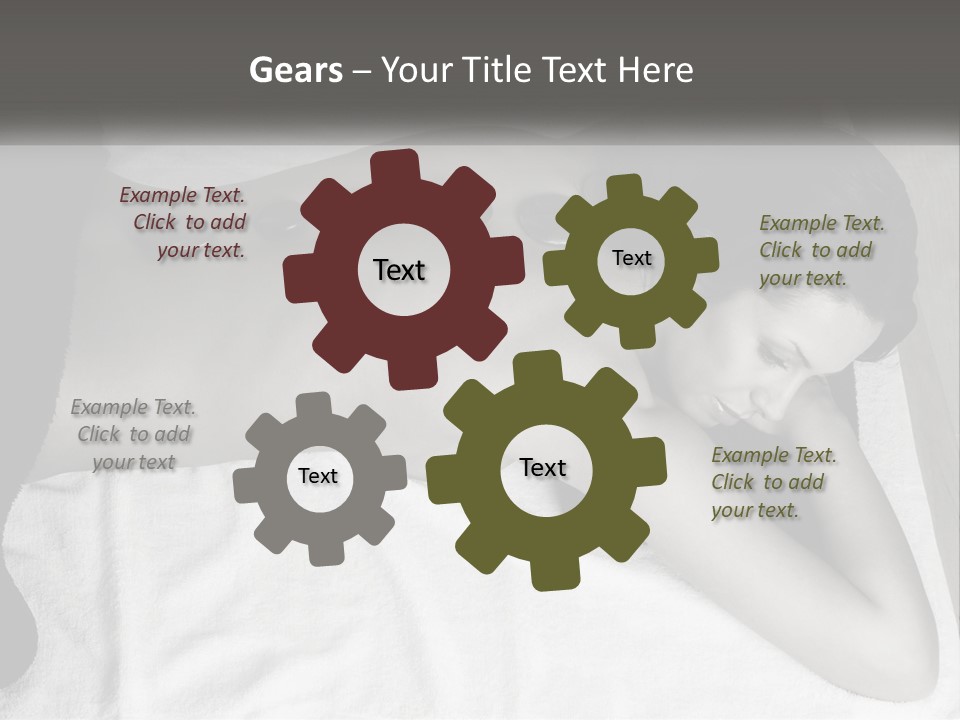 A Woman Laying On Top Of A Towel Covered In Stones PowerPoint Template