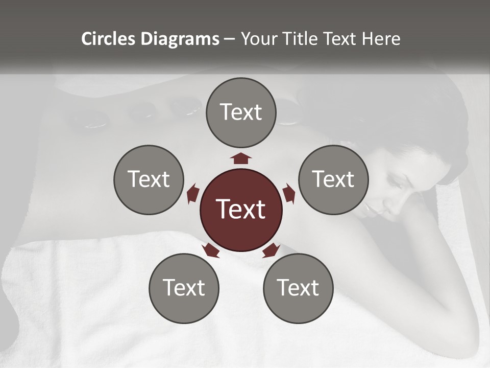 A Woman Laying On Top Of A Towel Covered In Stones PowerPoint Template