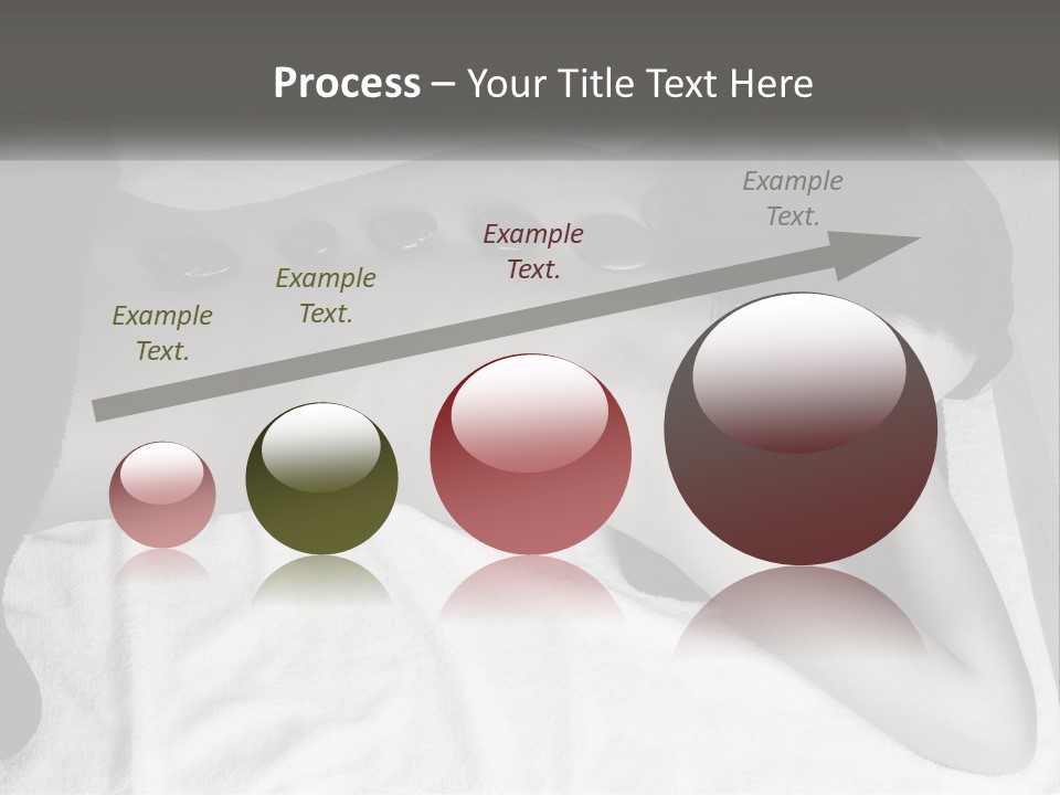 A Woman Laying On Top Of A Towel Covered In Stones PowerPoint Template