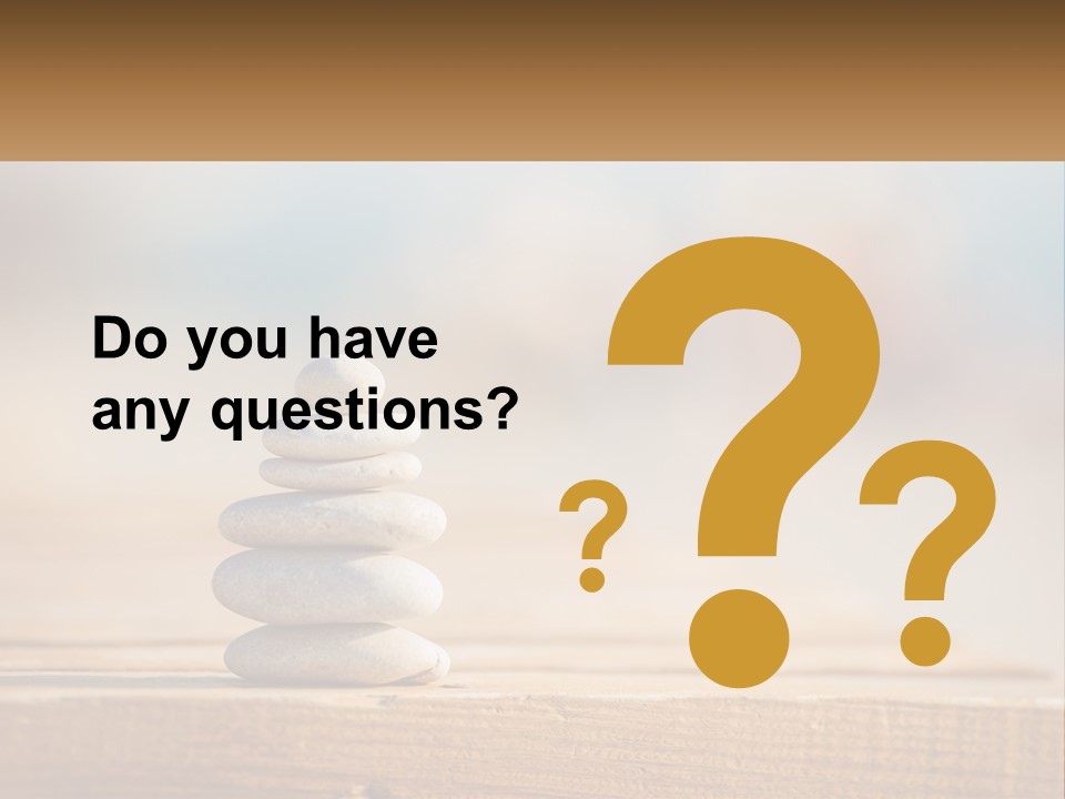 A Stack Of Rocks Sitting On Top Of A Wooden Table PowerPoint Template