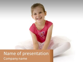 A Little Girl In A Pink Shirt Is Sitting On The Floor PowerPoint Template