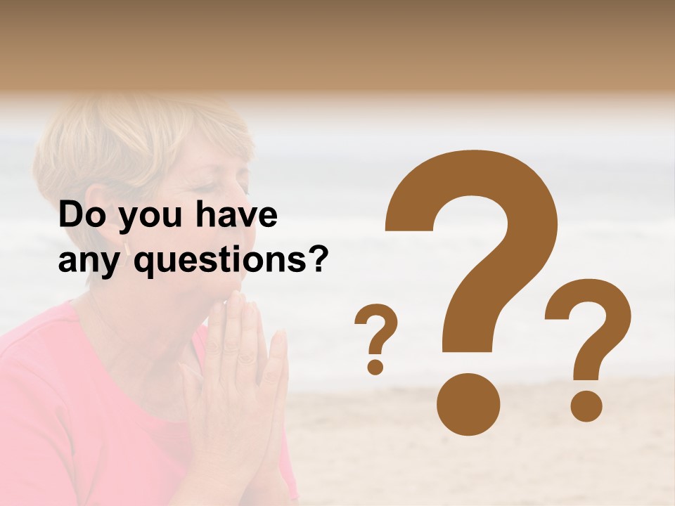 A Woman In A Pink Shirt Is Praying On The Beach PowerPoint Template