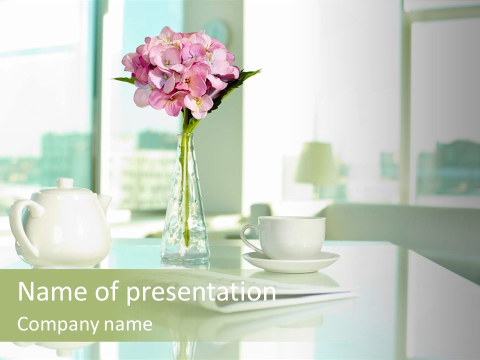 A Vase Of Flowers On A Table With A Cup And Saucer PowerPoint Template