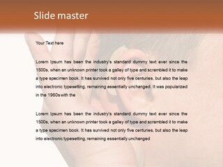 A Man Wearing A Pair Of Earplugs In His Ear PowerPoint Template
