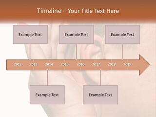 A Man Wearing A Pair Of Earplugs In His Ear PowerPoint Template