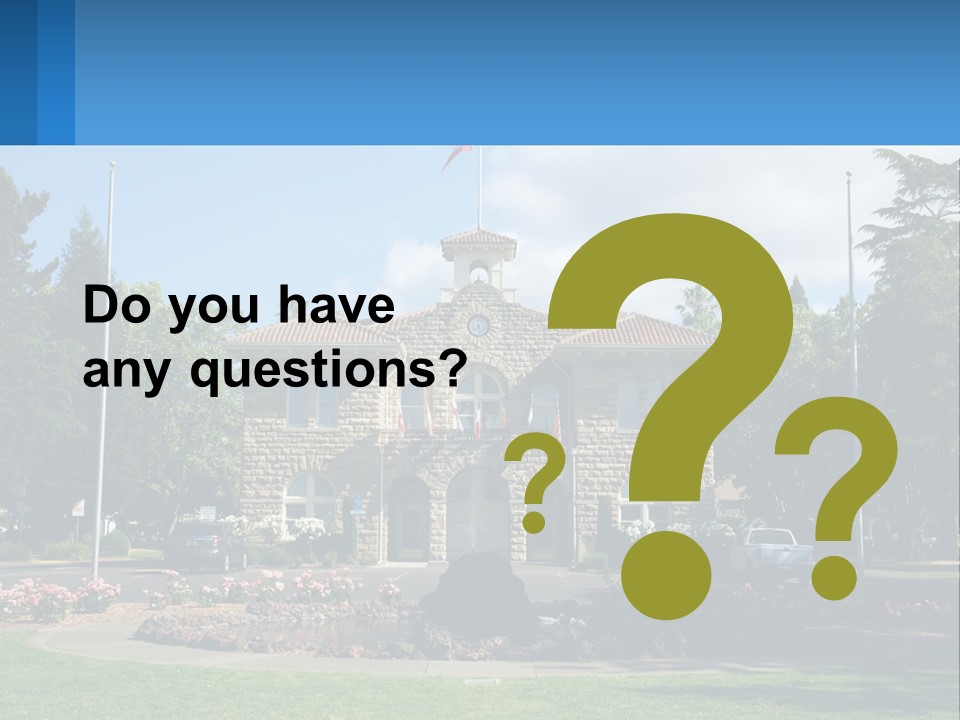 A Large Building With A Flag On Top Of It PowerPoint Template