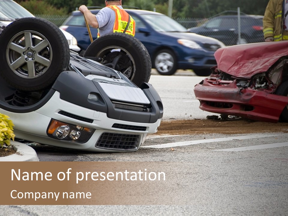 A Car That Has Been Flipped Over In A Parking Lot PowerPoint Template
