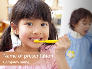 A Little Girl Brushing Her Teeth With A Yellow Toothbrush PowerPoint Template