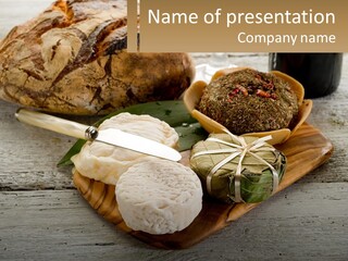 A Plate With Bread And Other Foods On It PowerPoint Template