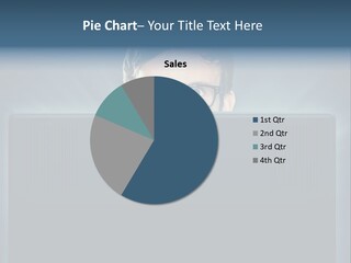 A Man With Glasses Is Looking At A Computer Screen PowerPoint Template