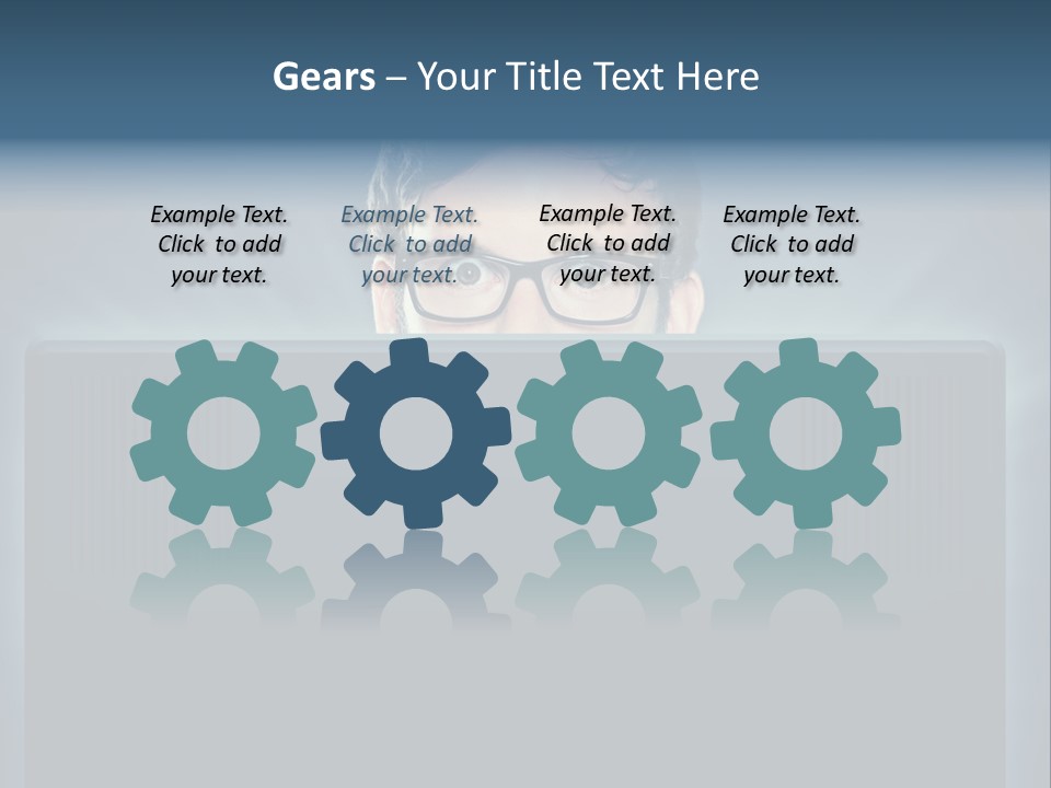 A Man With Glasses Is Looking At A Computer Screen PowerPoint Template