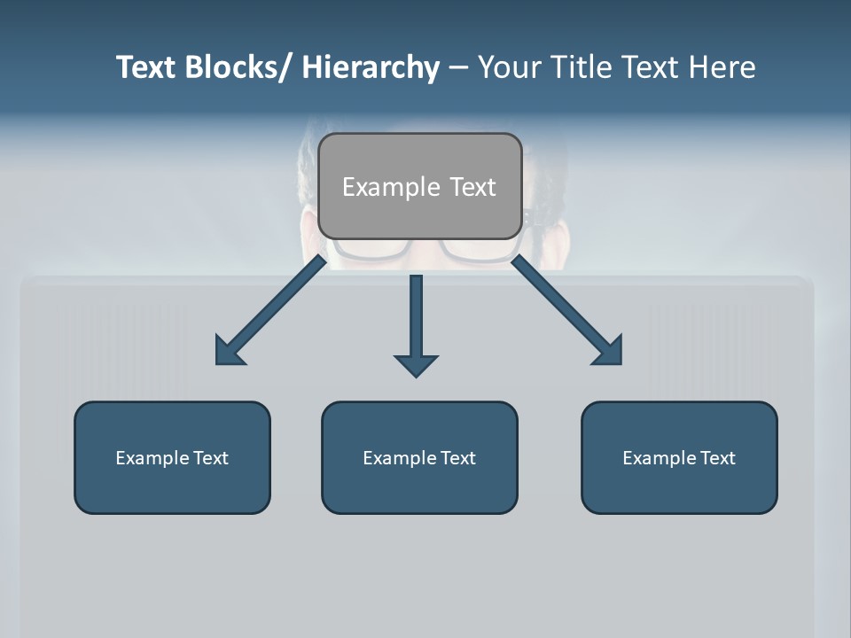 A Man With Glasses Is Looking At A Computer Screen PowerPoint Template
