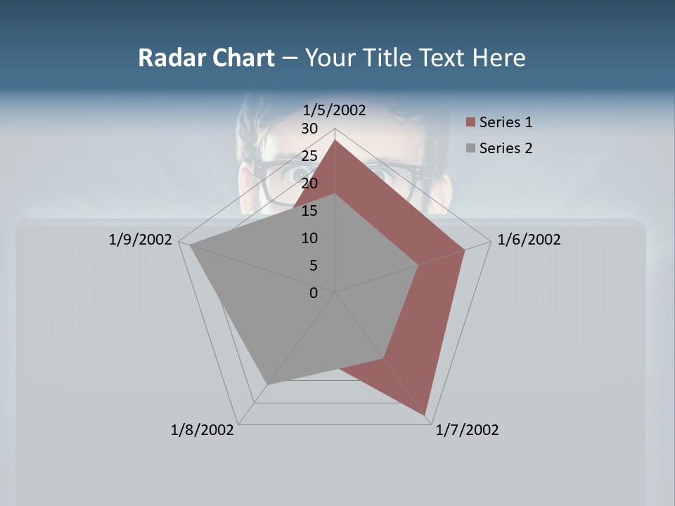 A Man With Glasses Is Looking At A Computer Screen PowerPoint Template