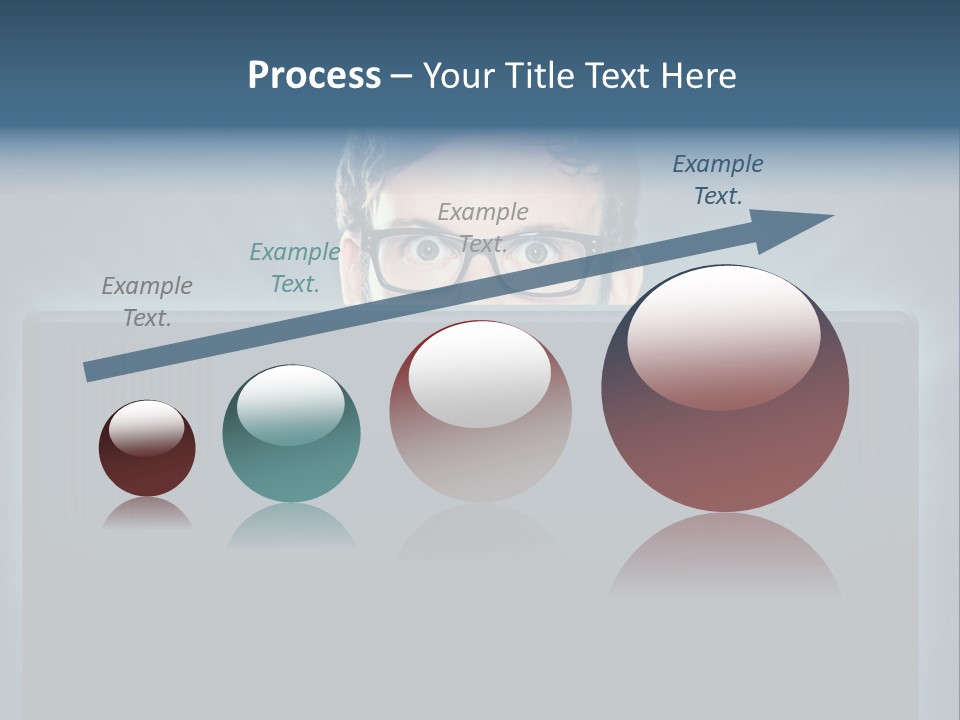 A Man With Glasses Is Looking At A Computer Screen PowerPoint Template