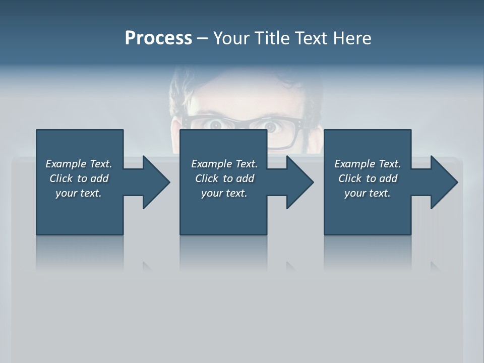 A Man With Glasses Is Looking At A Computer Screen PowerPoint Template