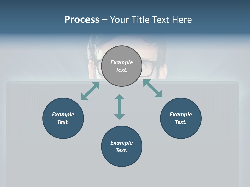 A Man With Glasses Is Looking At A Computer Screen PowerPoint Template