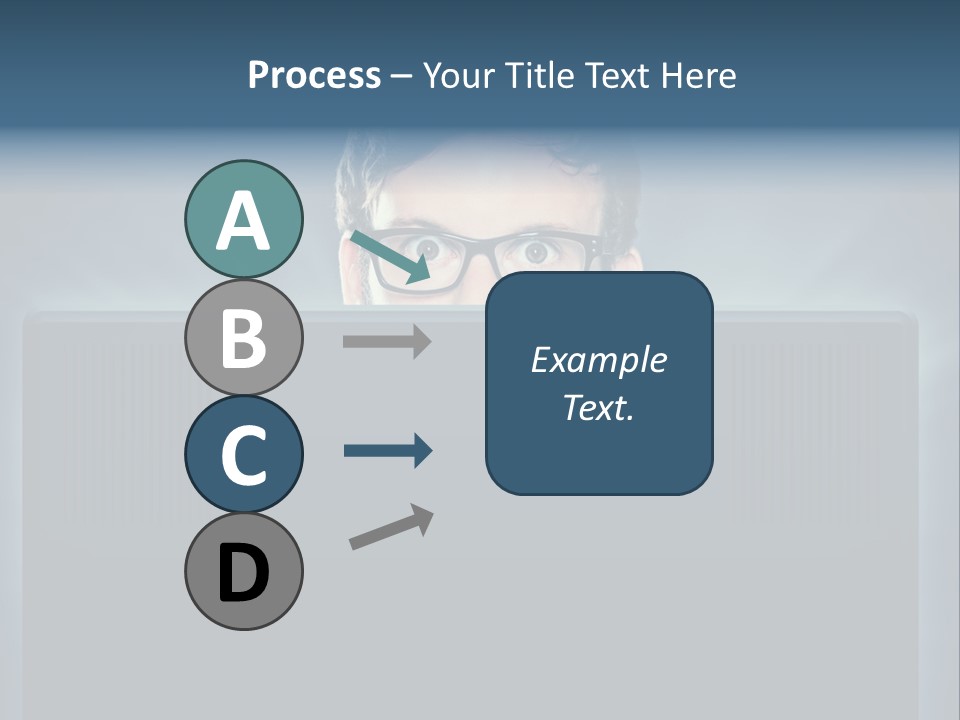 A Man With Glasses Is Looking At A Computer Screen PowerPoint Template