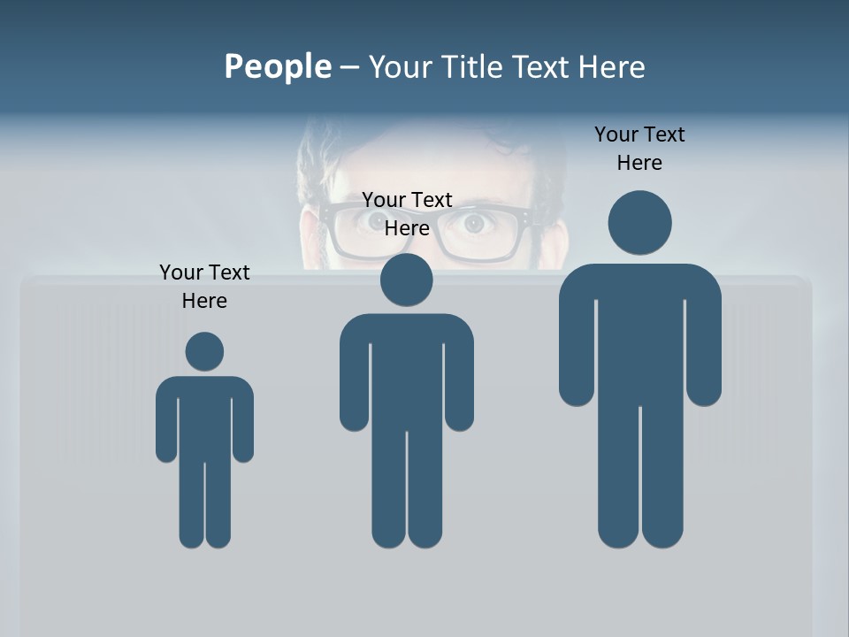 A Man With Glasses Is Looking At A Computer Screen PowerPoint Template