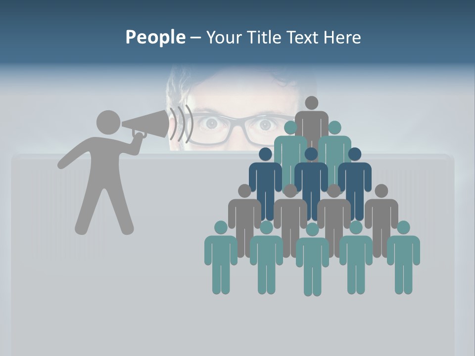 A Man With Glasses Is Looking At A Computer Screen PowerPoint Template