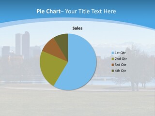 A Blue Landscape With Trees In The Foreground And A City In The Background PowerPoint Template