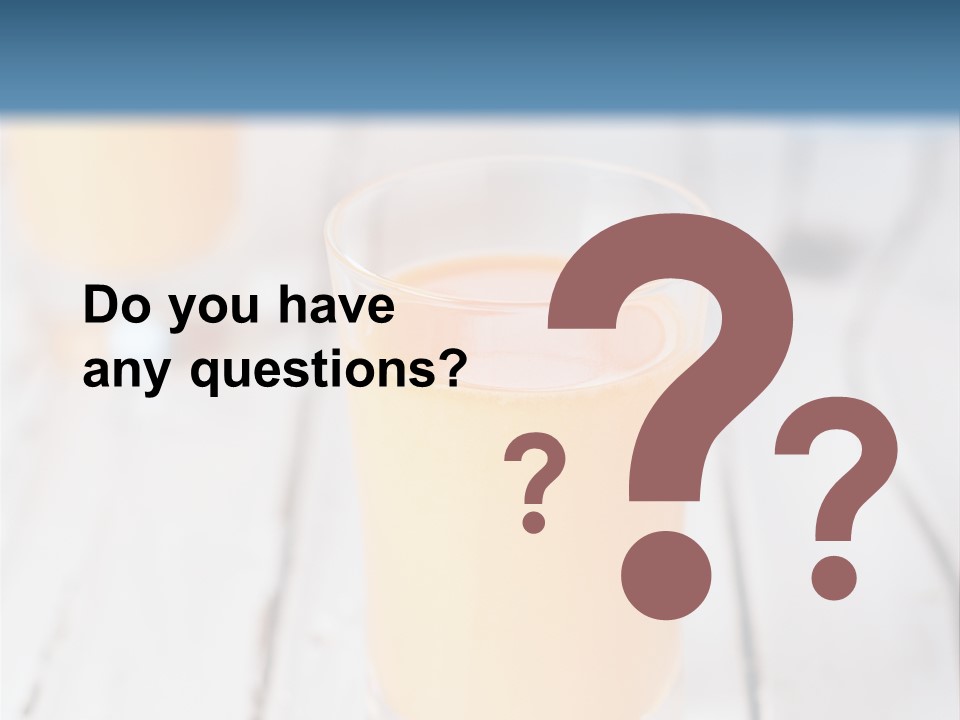 A Glass Of Orange Juice On A Wooden Table PowerPoint Template