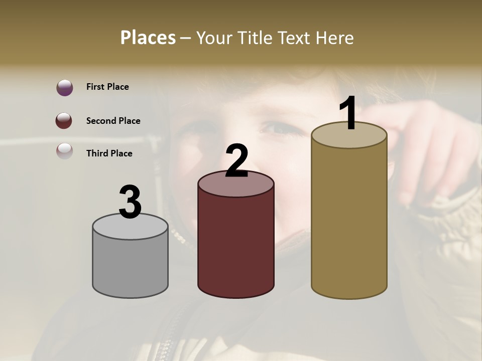 A Young Boy Is Smiling And Pointing At The Camera PowerPoint Template