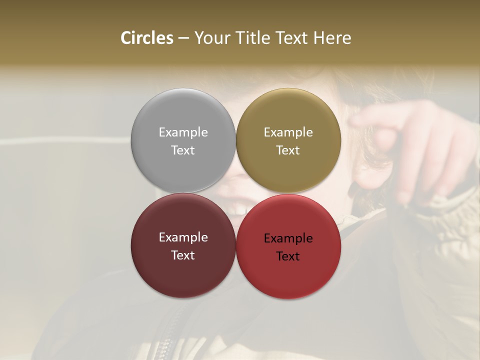 A Young Boy Is Smiling And Pointing At The Camera PowerPoint Template