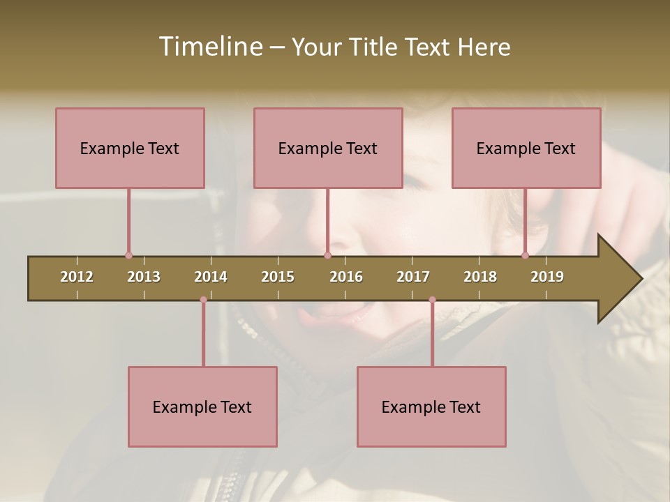 A Young Boy Is Smiling And Pointing At The Camera PowerPoint Template