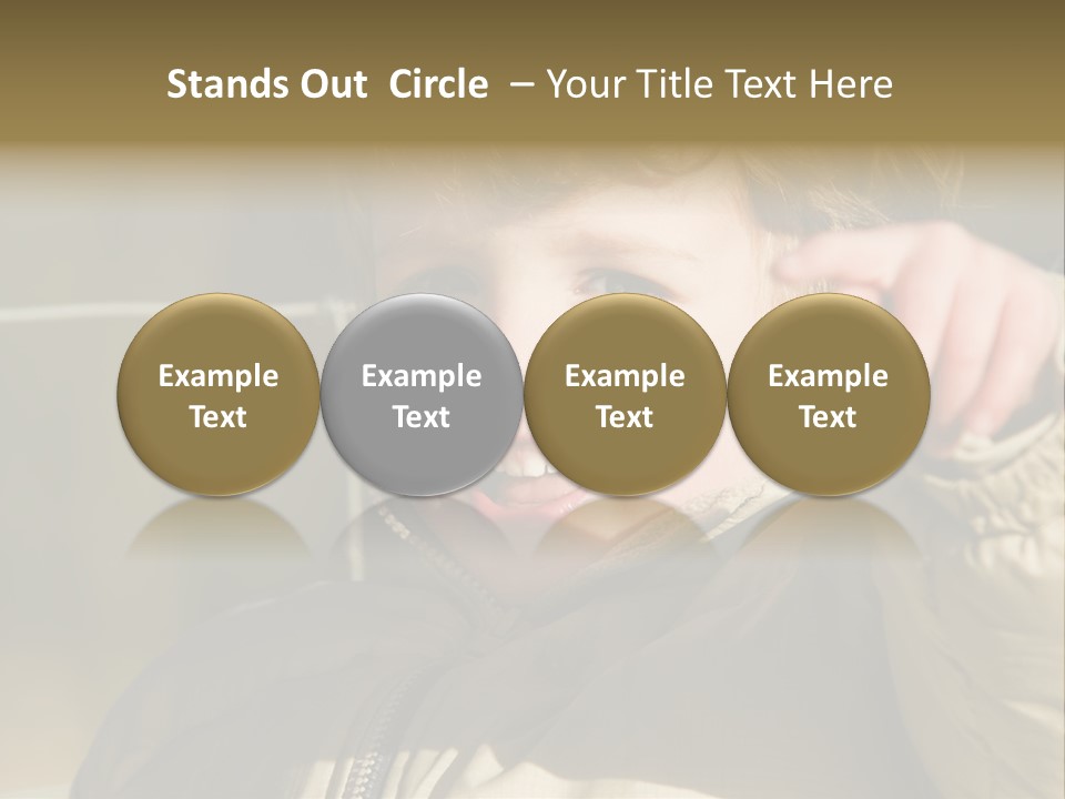 A Young Boy Is Smiling And Pointing At The Camera PowerPoint Template