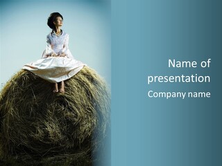 A Woman Sitting On Top Of A Pile Of Hay PowerPoint Template