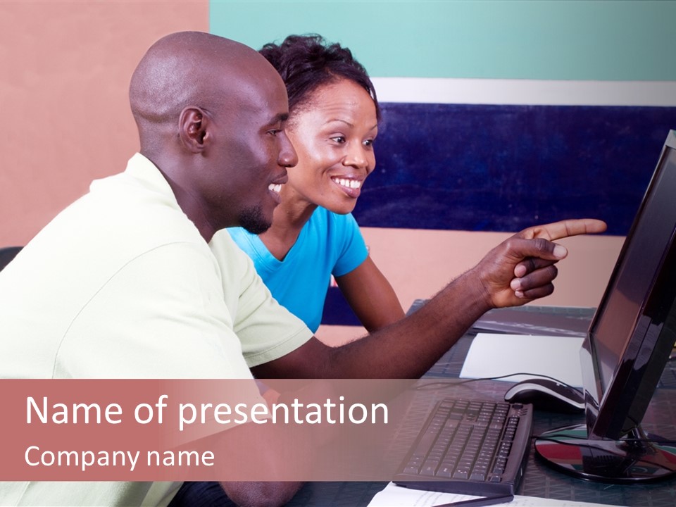 A Man And Woman Pointing At A Computer Screen PowerPoint Template