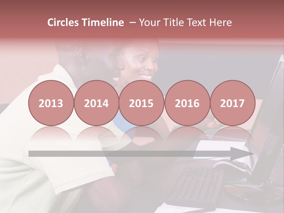 A Man And Woman Pointing At A Computer Screen PowerPoint Template