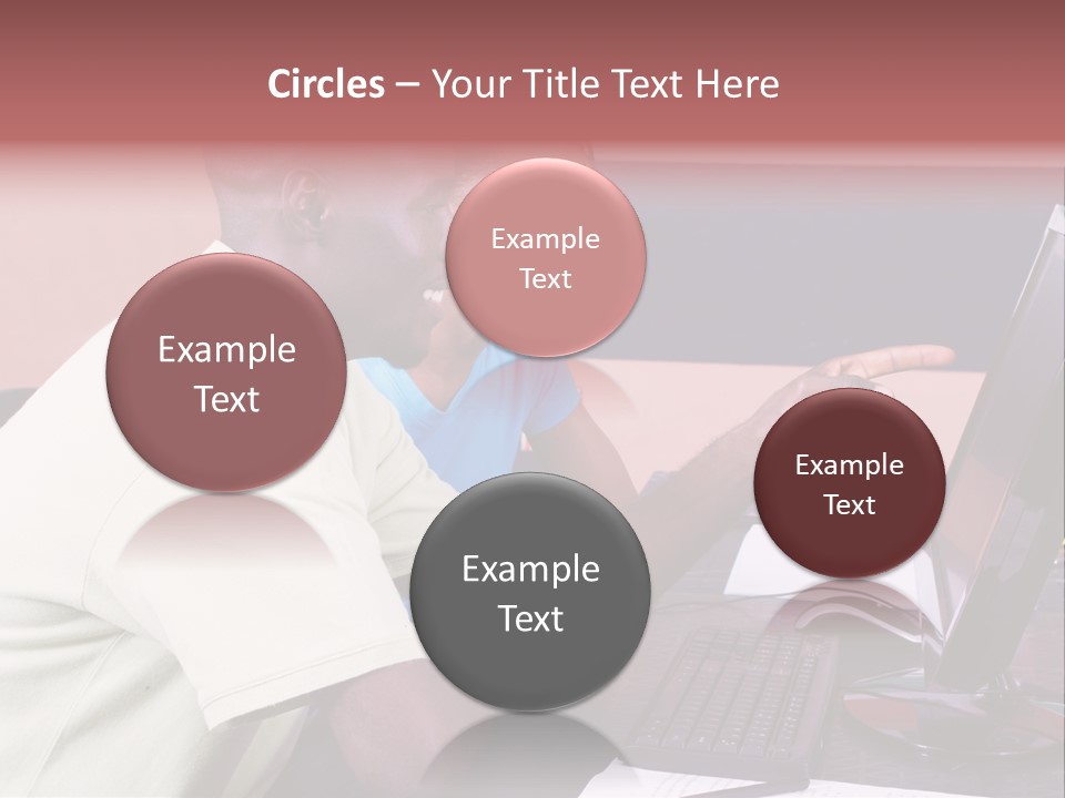 A Man And Woman Pointing At A Computer Screen PowerPoint Template