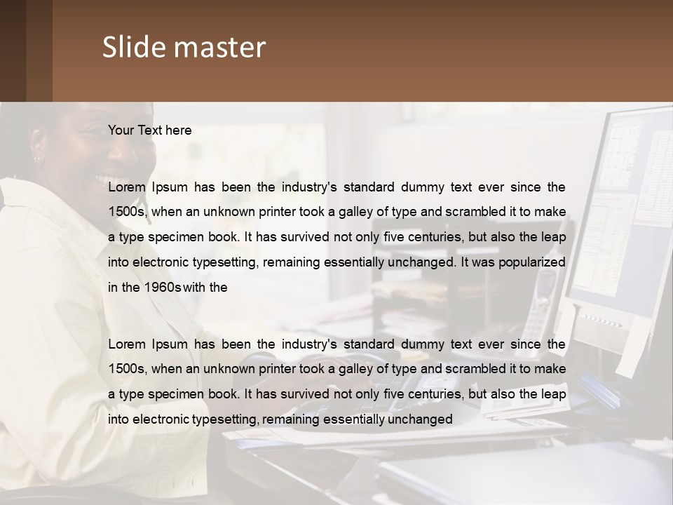 A Woman Sitting At A Desk With A Computer PowerPoint Template