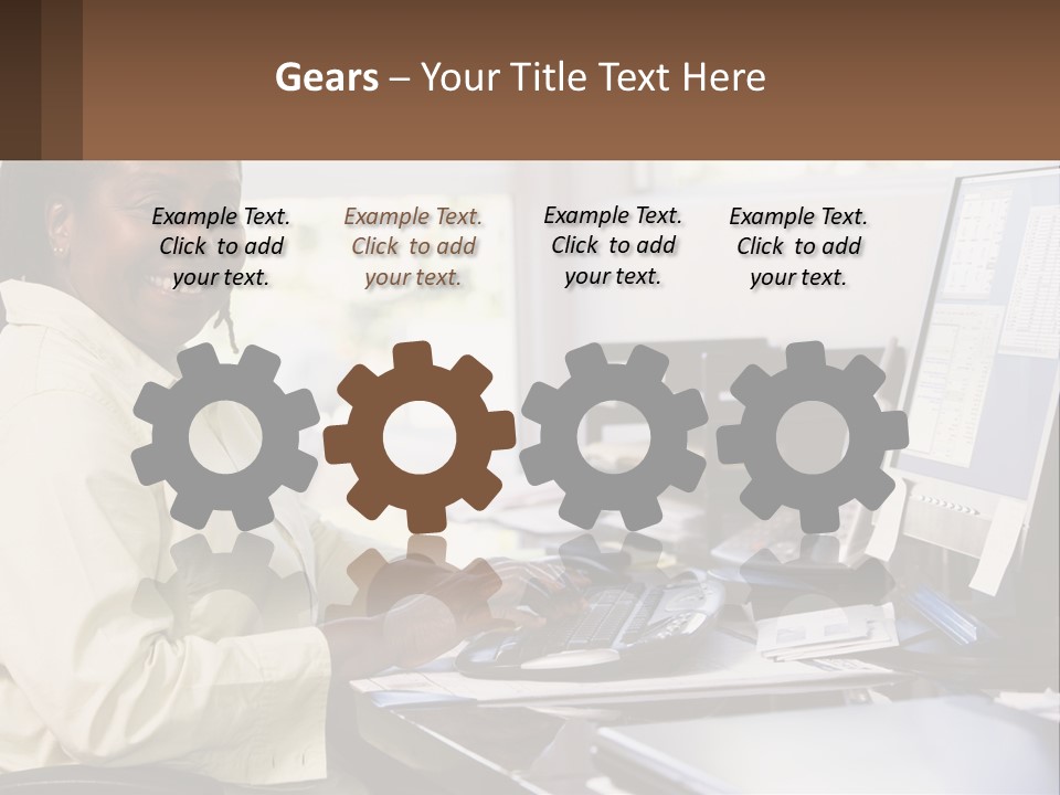 A Woman Sitting At A Desk With A Computer PowerPoint Template