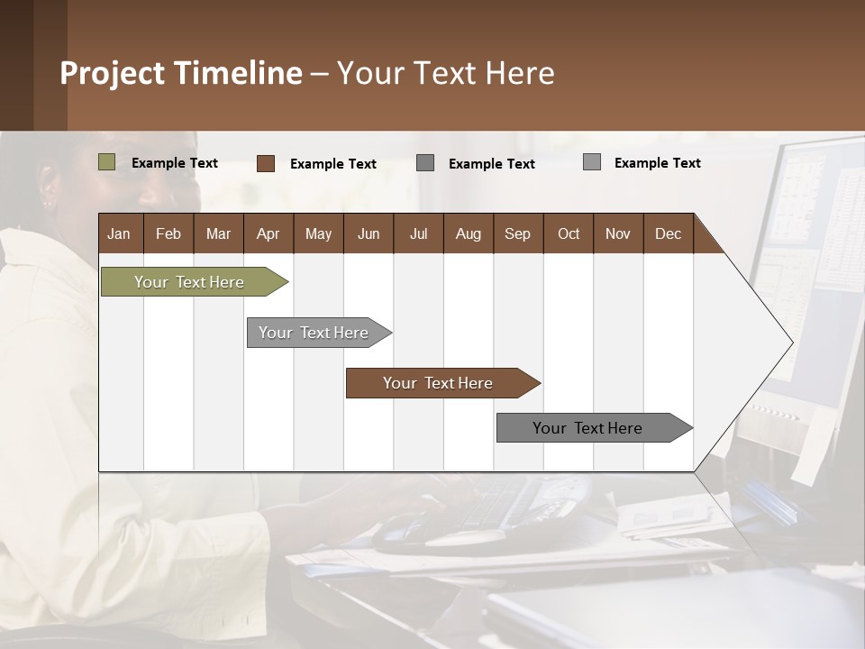 A Woman Sitting At A Desk With A Computer PowerPoint Template