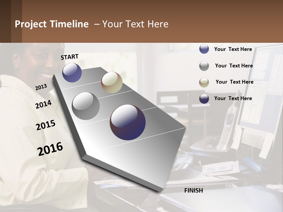 A Woman Sitting At A Desk With A Computer PowerPoint Template